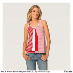 a woman standing with her hands on her hips wearing a red and white striped tank top