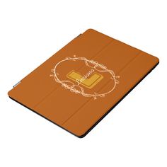 an orange ipad case with the word, i love you written on it and a gold frame