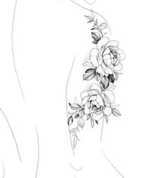 a woman's arm with flowers and leaves on the left side of her body