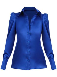 This fitted blue satin shirt is the embodiment of sophisticated opulence. Expertly constructed using quality materials and exceptional craftsmanship, it has a comfortable and modern aesthetic that makes it a refined addition to any curated wardrobe.  It has all details you'd expect from a perennial classic: a pointed collar, button-through front, and buttoned cuffs.  The shirt styles effortlessly whether tucked in our out. Team it with the Royal Azure Blazer & High-Waist Flared Trousers for an e Blue Satin Shirt, Curated Wardrobe, Shirt Blouses Women's, Spring Suit, Top Models, Satin Shirt, Blazer With Jeans, Shirt Styles, Stretch Satin