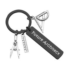 a keychain that has some scissors on it and the words future architecture written on it