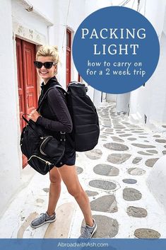 a woman with a backpack walking down the street in front of a red door that says packing light how to carry on for a 2 week trip