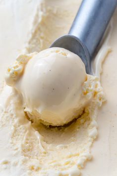 a scoop of ice cream sitting on top of a table