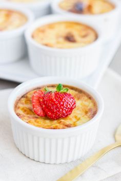 small dessert dishes with strawberries in them