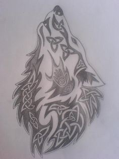 a drawing of a wolf's head with an intricate design on the back of it