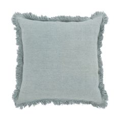 a light blue pillow with fringes on the front and back of it, against a white background