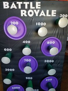 a purple and white game board with buttons on it's sides, in front of a black background