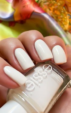 A complete review of the Essie Blanc nail polish with swatches – a gorgeous, crisp white nail polish that is sure to make a statement! - - - - best essie nail polish colors - white essie nail polish swatches - best drugstore nail polish brands - white nail polish swatch - best essie nail colors - white nail polish aesthetic White Nails Aesthetic, Nail Polish Aesthetic, Best Drugstore Nail Polish, Polish Aesthetic, Drugstore Nail Polish, Matte White Nails, Sheer Nail Polish, Sheer Nails