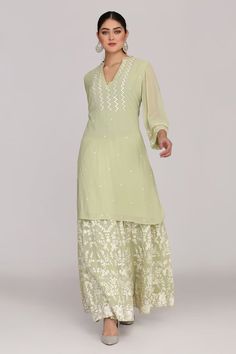 Pista green kurta featuring resham embroidery. Paired with a floral resham embroidered sharara and a dupatta. - Aza Fashions Pista Green Sharara With Resham Embroidery And Straight Kurta, Pista Green Sharara With Resham Embroidery For Eid, Eid Pista Green Sharara With Resham Embroidery, Semi-stitched Green Sharara With Chikankari Embroidery, Green Palazzo Set With Straight Kurta And Resham Embroidery, Green Kurta With Chikankari Embroidery In Georgette, Semi-stitched Green Palazzo Set With Floral Embroidery, Green Georgette Palazzo Set With Chikankari Embroidery, Green Embroidered Sharara With Straight Kurta