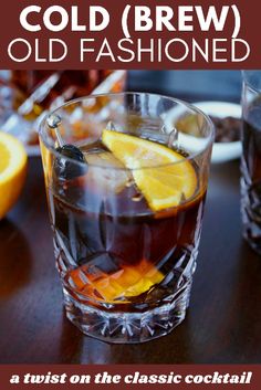 an old fashioned drink with orange slices in it and the caption cold brew old fashioned