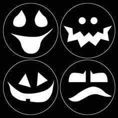 four black and white halloween faces with different expressions on the front, one for each face