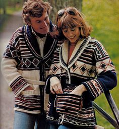 a man and woman walking down a path together