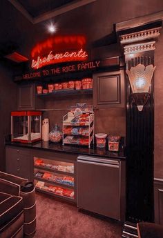 the interior of a fast food restaurant with neon signs above it and various foods on display