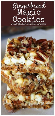 gingerbread magic cookie bars stacked on top of each other with nuts in the middle