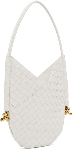 Intrecciato-woven grained leather shoulder bag in white. · Fixed shoulder strap · Knotted hardware at sides · Self-tie fastening at throat · Integrated suede zip pouch at interior · Suede lining · H11.5 x W9 · Total height: H17.5 Supplier color: White/Brass Luxury White Shoulder Bag With Intrecciato Weave, Luxury White Intrecciato Weave Shoulder Bag, Designer White Shoulder Bag With Braided Handles, Luxury White Woven Leather Shoulder Bag, Modern White Shoulder Bag With Intrecciato Weave, Designer White Shoulder Bag With Woven Leather, Modern White Bag With Intrecciato Weave, White Intrecciato Weave Crossbody Bag, White Woven Leather Evening Shoulder Bag