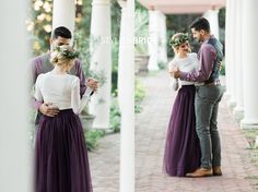 a man and woman standing next to each other in front of columns with flowers on their heads