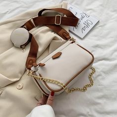 Brand Name: MR.YLLSShape: FLAPHandbags Type: Shoulder BagsTypes of bags: Shoulder Crossbody BagsOrigin: CN(Origin)Main Material: PUClosure Type: zipperHardness: SOFTStyle: FashionLining Material: PolyesterOccasion: VersatileGender: WOMENPattern Type: SolidNumber of Handles/Straps: TwoInterior: Interior Zipper PocketDecoration: ChainsDecoration: LetterItem Type: Handbags Chains Women, Designer Crossbody Bags, Small Purse, Messenger Bags, Chain Shoulder Bag, Bag Set, Wide Straps, Chester, Sling Bag