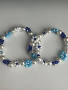 Greece inspired flower bracelets Trendy Silver Flower Bracelets, Trendy Flower Bracelets For Friendship, Trendy Blue Flower Bracelet, Blue Flower Bracelets For Friendship, Blue Flower Bracelet For Friendship, Blue Flower Friendship Bracelet, Greece Bracelet, Accessories Idea, Diy Beaded Rings