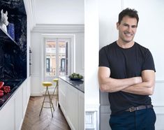 a man standing in front of a kitchen counter next to an image of fruit on the counter