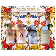 three different perfume bottles in front of a floral wallpaper with the words dolce garbana on it