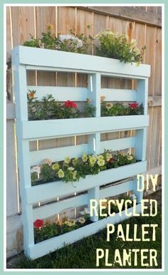 an old pallet is transformed into a planter