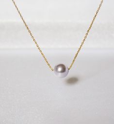 "Simple but very elegant necklace that is perfect for bridal gifts and everyday wear. // ITEM DETAILS // *This listing item for Lavender Pearl Necklace, but you can select the defferent colors of the pearl (see photo4) - Genuine Lavender Swarovski Crystal Pearl measures 8mm - 14K Gold Fill, 14k Rose Gold Fill, Sterling Silver chain and findings Also, available in Gold Plated, Rose gold Plated, Silver Plated chain and findings - Beautiful gift wrapped with note in the box // LENGTH // - Length sh Elegant Purple Clavicle Chain Necklace, Elegant Purple Necklace With Delicate Chain, Elegant Lavender Pendant Necklace, Elegant Purple Pearl Necklace For Wedding, Elegant Purple Pearl Drop Necklace, Elegant Single Strand Lavender Necklace, Lavender Elegant Necklace For Wedding, Elegant Lavender Single Strand Necklace, Elegant Lavender Necklace For Wedding