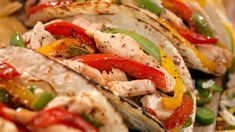 chicken fajitas with peppers and onions on a plate