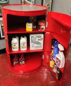 a red shelf that has some bottles on it