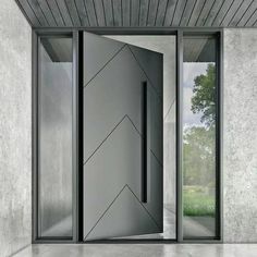 gloryirondoors handcraft black iron pivot door with full iron panel Custom Pivot Front Door, Grey Door Design Modern, Grey Entrance Door, Main Door Design Entrance Black, Black Pivot Door, Grey Doors Exterior Entrance, Black Entrance Door Modern, Black Modern Front Door Entrance, Black Main Door Entrance