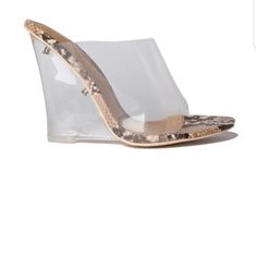 Clear Transparent Mule Peep Toe Wedge Heel Snake Animal Print 4” Heel Runs True To Size New Never Worn Without Tag And Possibly No Box. Only Tried It. Clear Platform Wedge Sandals, Clear Wedge Heels With Clear Strap, Clear Synthetic Wedge Sandals, Chic Clear High Heel Wedge Sandals, Clear Wedge Sandals With Clear Strap, Wedge Sandals With Clear Strap, Clear Wedge Sandals For Party, Elegant Clear Wedge Heels, Block Heel Mule