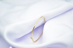 14k Plain Gold Classic Bangle,Slip on Bracelet,Handmade Gold Bangle Bracelet,Stacking Round Bangle Bracelet,Thin Bangle,Elegant Round Bangle Elevate your accessory game with our Simple 14K Gold Bracelet, a stunning piece that combines elegance and simplicity. This handmade jewelry is crafted with precision, making it an essential addition to any jewelry collection. Key Features: ▪️Material: Premium 14K gold, ensuring lasting quality and a luxurious shine ▪️Design: Minimalist and sleek, perfect f Minimalist Bangle, Custom Bangle, Classic Bangles, Bracelet Stacking, The Bangles, Design Minimalist, Gold Bangle Bracelet, Gold Bangle, Handmade Gold