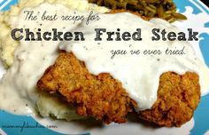 the best recipe for chicken fried steak you've ever tried on a blue and white plate