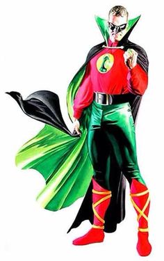 a man dressed in green and red is standing with his hands on his hips while wearing a cape