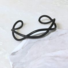 Cali Beach Waves Cuff - LOW STOCK Modern Black Metal Bangle, Modern Black Bangle As Gift, Black Minimalist Bangle Jewelry, Minimalist Black Bangle Jewelry, Modern Black Cuff Bangle Bracelet, Minimalist Black Cuff Bracelet Gift, Black Minimalist Cuff Bracelet Gift, Black Minimalist Metal Cuff Bracelet, Black Minimalist Cuff Bracelet For Gift