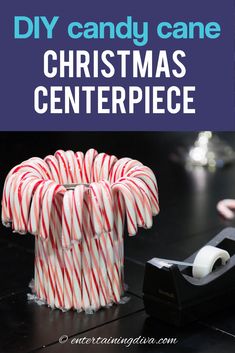 some candy canes are sitting on a table with the words diy candy cane christmas centerpiece