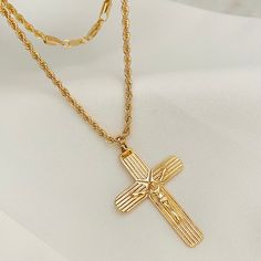 A men's Jesus Christ necklace is a striking and meaningful piece of jewelry that symbolizes faith and devotion to Jesus, constantly reminding him of his teachings and sacrifice. Your special someone will love this men's Crucifix Necklace. If you like, add it to the cart to get one of them. PRODUCT DESCRIPTION Mens Crucifix Necklace Material: - 18K Gold Filled - Crucifix Size: 50x31 mm - Rope Chain: - Length: 24 inches  - Width: 3mm  BENEFITS -Hypoallergenic -Water Resistant -Tarnish Resistant -P Spiritual Rope Chain Necklace, Gift Cross Pendant Necklace With Rope Chain, Gift Rope Chain Necklace With Cross Pendant, Rope Chain Necklace With Cross Pendant For Gift, Spiritual Cross Jewelry For Father's Day, Gold Cross Necklace For Father's Day, Big Cross Necklace, Christ Necklace, Jesus Necklace