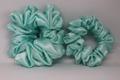 Lucy, is a handmade soft and shiny satin scrunchie.  It comes in two sizes, Large and Mini The mint green colour is perfect for any occasion.  The elastic is about 15 - 20 cm long and will fit around the hair 2 till 3 times. Green Colour, Hair Ties, Scrunchies, Mint Green, Green Colors, Netherlands, 20 Cm, Hair Accessories, Mint