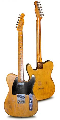 two guitars are sitting next to each other on a white background, one is yellow and the other is black