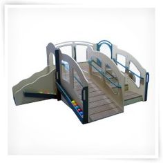 a play set with slides and ramps for children to slide down the hill or over