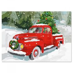 an old red truck with a christmas tree on the back is driving through snow covered ground