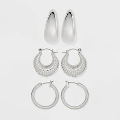 Enjoy your day in style with the Tube/Shrimp/Wide Hoop Earring Set from Universal Thread™. This silver-tone hoop earring set includes one pair in a tube design, one in a shrimp design and one in a wide hoop shape to give your options. Designed with clip-in clasp and post-back closures for a nice fit, these nickel-free earrings suit most skin types. Universal Thread™: Found exclusively at Target. Shrimp Design, Hoop Earring Set, Tube Design, Enjoy Your Day, Nickel Free Earrings, Hammered Metal, Hoop Earring Sets, Free Earrings, Accessories Jewelry Earrings