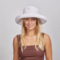 Shield yourself from the sun in style with our Sunny Cotton Sun Hat. Made with premium cotton, this hat features a 1" upturn brim for added protection. Embrace a sophisticated and exclusive look with this must-have accessory. Flat Brim Panama Hat With Upf 50+, Panama Hat With Upf 50+ And Flat Brim, Solid Flat Brim Sun Hat With Uv Protection, Solid Sun Hat With Uv Protection And Flat Brim, Sun Hat With Uv Protection And Flat Brim, Upf 50+ Wide Brim Panama Hat, Classic Wide Brim Sun Hat With Upf 50+, Solid Wide Brim Bucket Hat With Upf 50+, Classic Sun Hat With Upf 50+