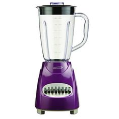 a purple blender sitting on top of a white table