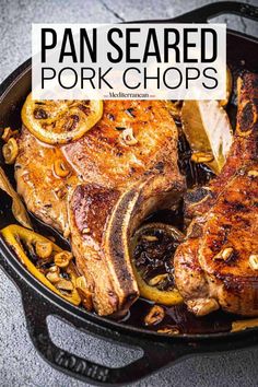 pan seared pork chops in a cast iron skillet