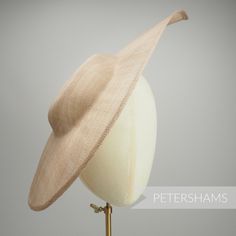 Get Royal Ascot ready with this extra large pointed tip Latte Brown sinamay fascinator base! Made from a triple layer of stiffened sinamay millinery fabric and is ideal for making an instant hat. This shape has a lovely pointed tip and a shallow crown. Get creative by positioning it at different angles on the head! Just add a headband for securing to the head (not included but available in our shop!) *This is not a fitted hat! You will need to sew in a headband or comb to attach it to your head* Canterbury England, Wedding Birdcage, Sinamay Fascinator, Millinery Supplies, Hat Base, Large Hats, Fascinator Hat, Millinery Hats, Tail Feathers