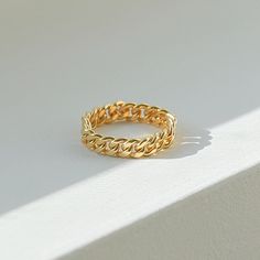 *Buy 2 items, Get 15% OFF your order. Coupon applied at checkout.* A modern and timeless gold curb chain ring. This curb chain ring looks great stacked with your favorites or on its own. Made from durable materials that are perfect for everyday wear! - Band Thickness: 4.1 mm. - Loose link chain - Made in gold vermeil: a thick 18k gold layer on sterling silver. - 1 Year warranty GIFT WRAP AVAILABLE TO PURCHASE: https://www.etsy.com/listing/902780367/gift-wrap-for-gift-jewelry-pouch-jewelry?ref=sh Cuban Link Ring, Gold Chain Ring, Chain Ring Gold, Herkimer Diamond Earrings, Gold Curb Chain, Gold Stacking Ring, Link Ring, Layered Rings, 18k Gold Chain