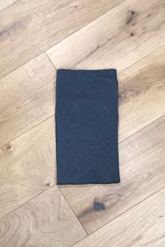 a blue towel is laying on the floor