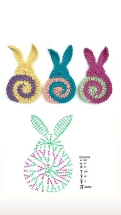 three crocheted bunnies sitting next to each other