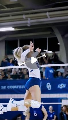 the volleyball player is jumping to hit the ball