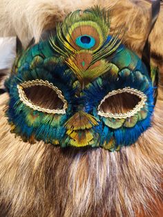 This gorgeous peacock feather mask is one of a kind! Perfect for Mardi Gras, cosplays, or masquerade ball! Green Masks For Carnival Masquerade, Green Carnival Costume Mask, Green Costume Mask For Carnival, Green Masks For Masquerade Carnival, Green Carnival Masks And Prosthetics, Green Mask For Masquerade Carnival, Green Masquerade Mask For Mardi Gras, Green Eye Mask For Masquerade, Green Masks For Mardi Gras Carnival